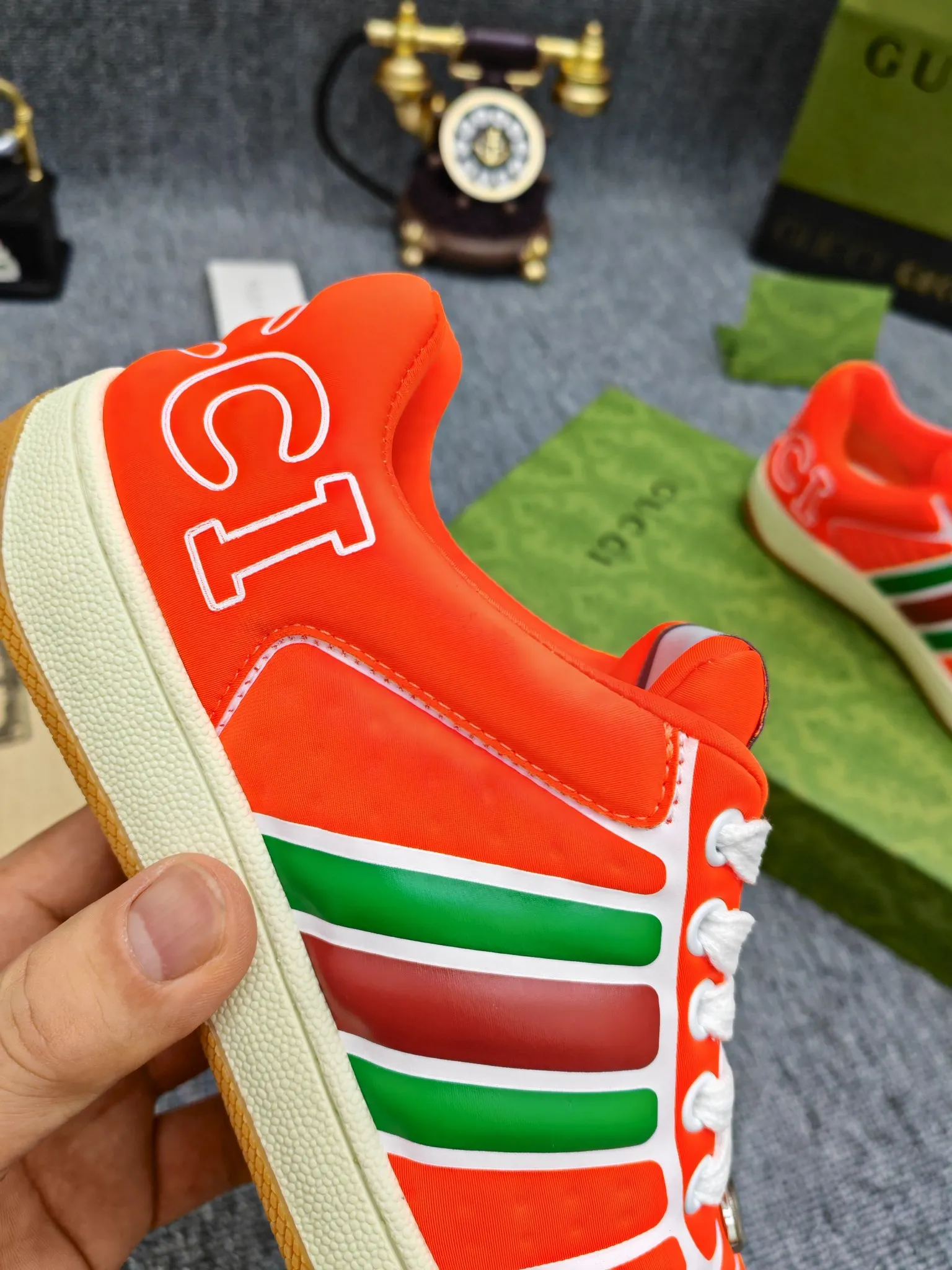 Factory price 600💰Screener series embellished web sneakers. This item is from the Gucci Lido series. Its design is inspired by the summer style and beach clubs of the Italian coast. The Screener series of sneakers draws inspiration from classic sneakers from the 1970s and takes its name from a special defensive move in sports. This shoe from the 2024 Pre-Fall collection is crafted from yellow rubber, a technical and malleable opaque material, with striped webbing on the sides and an embossed Gucci printed logo on the heel. Yellow rubber, opaque and technological in appearance. Red and green webbing decorated with metal Double G oval enamel details. Gucci printed embossed logo. Women 35-40, men 38-45, (men 38 and 45 need to be customized)